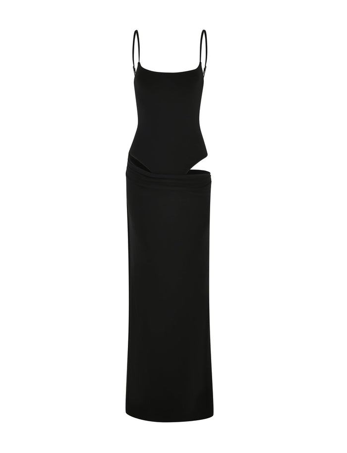 The UMA DRESS - BLACK by TIGERMIST features adjustable spaghetti straps, a fitted bodice, and an asymmetric waist cutout for a chic, modern style.