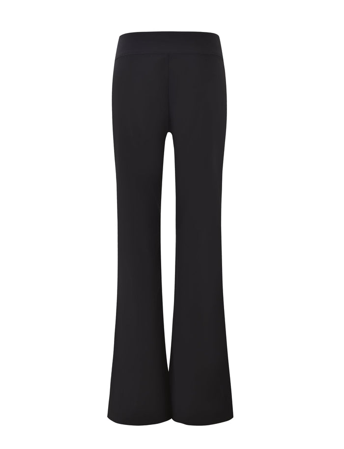 The VESPER PANT - BLACK by TIGERMIST is showcased against a plain white background. These high-waisted pants feature a sleek, minimalist design with wide legs that flare at the bottom, offering a striking yet fitted silhouette.
