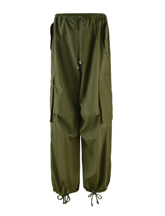 TIGERMIST VIOLETTE PANT in khaki green features an elastic drawstring waist, ankle ties, large side pockets, adjustable fit, and a relaxed loose style.