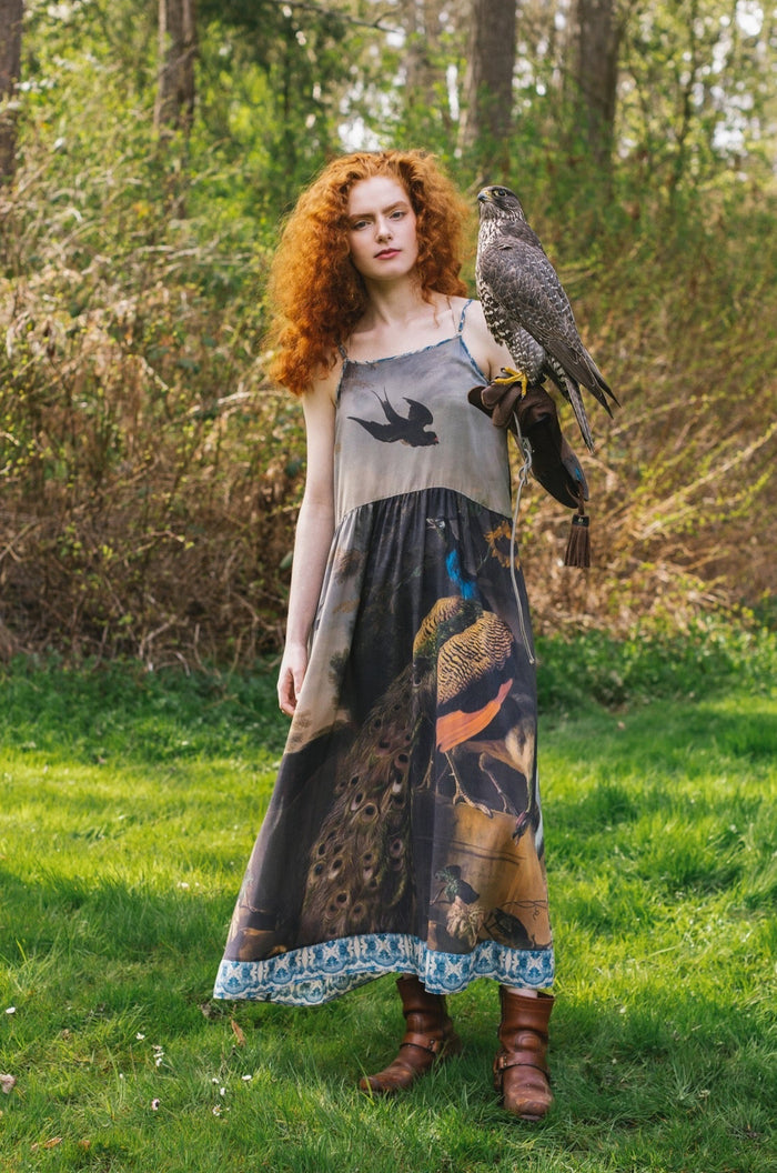 Model wearing Wild Beauty Bohéme Slip Dress featuring peacock birds and antique florals – Market of Stars
