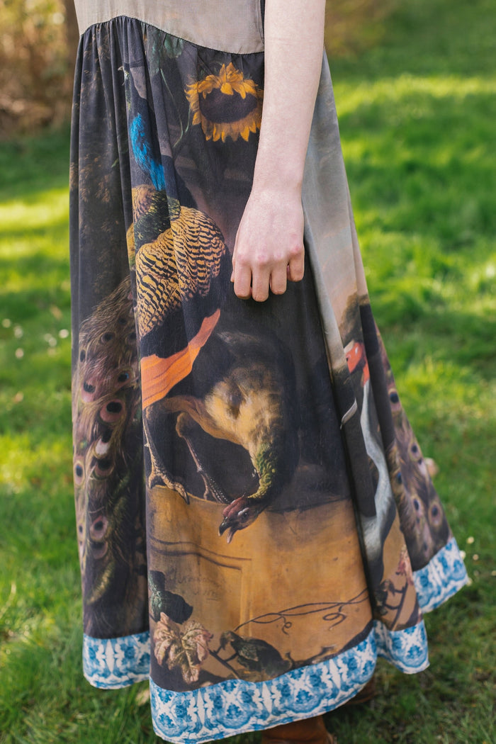 Model wearing Wild Beauty Bohéme Slip Dress featuring peacock birds and antique florals – Market of Stars