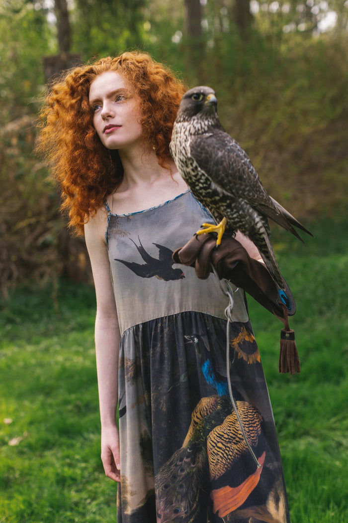 Model wearing Wild Beauty Bohéme Slip Dress featuring peacock birds and antique florals – Market of Stars