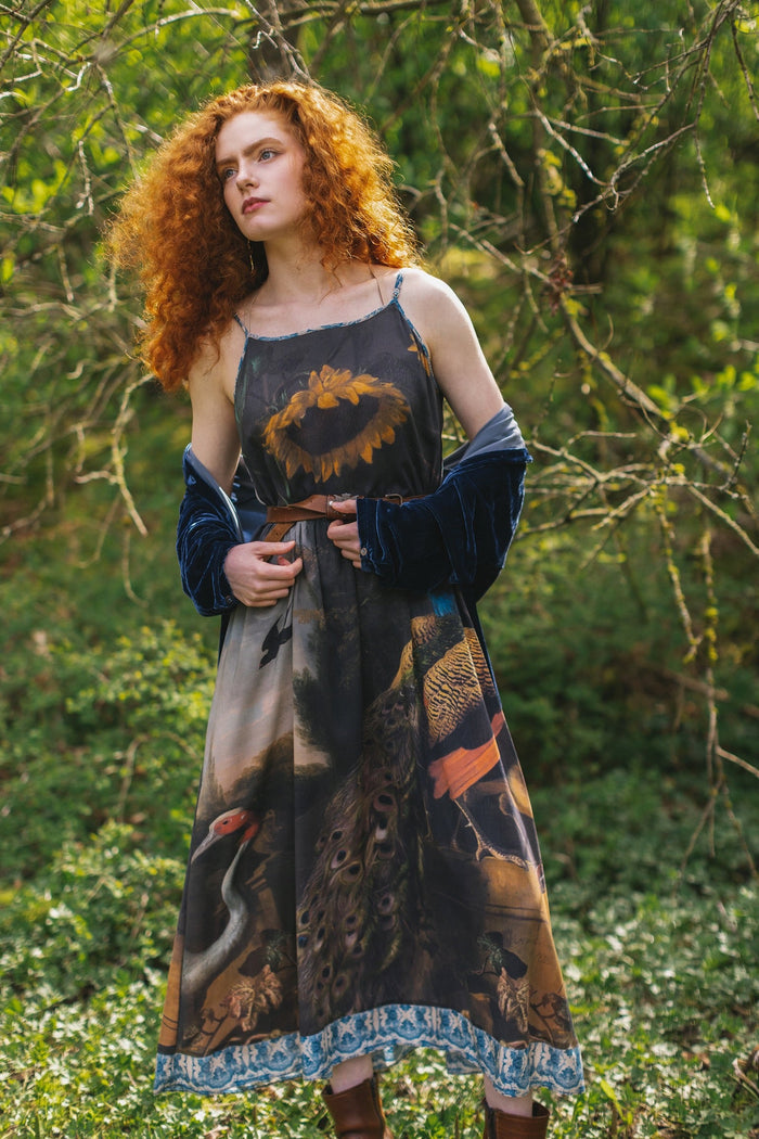 Model wearing Wild Beauty Bohéme Slip Dress featuring peacock birds and antique florals – Market of Stars
