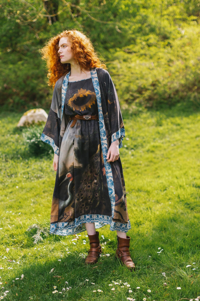 Model wearing Wild Beauty Bohéme Slip Dress featuring peacock birds and antique florals – Market of Stars