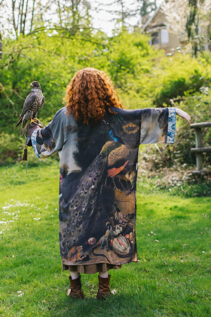 Model wearing Wild Beauty Opera Duster with antique lush florals and peacock – Market of Stars