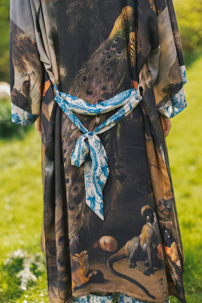 Model wearing Wild Beauty Opera Duster with antique lush florals and peacock – Market of Stars