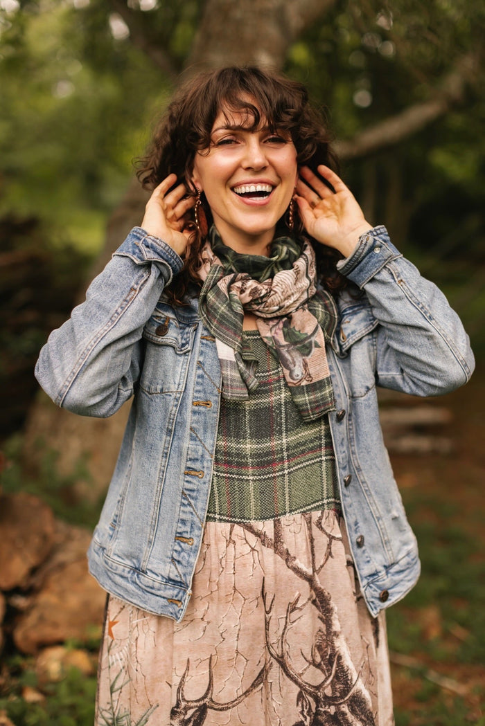 Model wearing a bamboo viscose scarf with a nostalgic print, snowflake wonder and the magic of the holiday season - Market of Stars