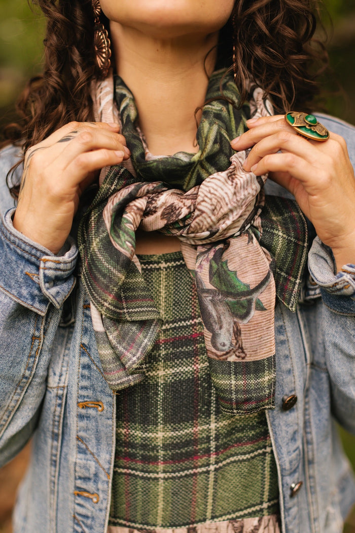 Model wearing a bamboo viscose scarf with a nostalgic print, snowflake wonder and the magic of the holiday season - Market of Stars
